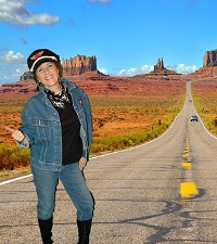 Girl hitch-hiking on route 66